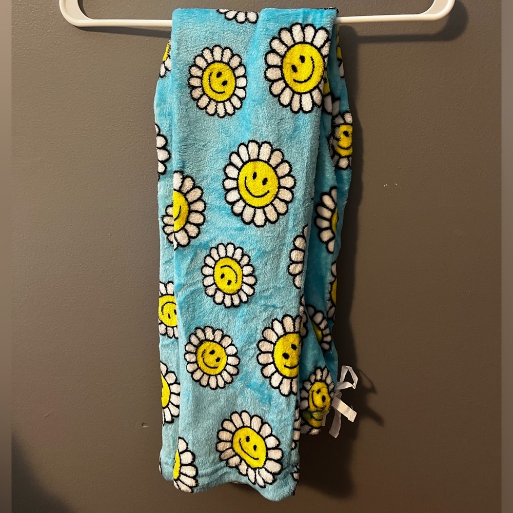 Medium Five Below Pajama Pants, blue with yellow and white smiling flowers